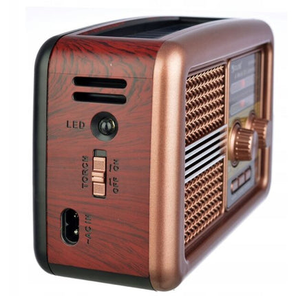 Retro style portable radio with built-in solar panel
